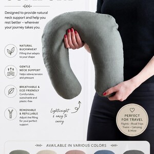 Large U-shaped buckwheat travel pillow held in hands, showing size and ergonomic neck support design