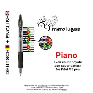 May include: A black and white peyote stitch pattern for a pen cover, featuring a piano keyboard design with red flowers. The pattern is for a Pilot G2 pen. The pattern is called "Piano" and is available on Etsy.