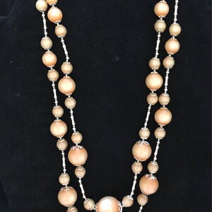 Vintage inspired orange peach cat eye lucite bead beaded multistrand layer necklace with silver adjustable clasp