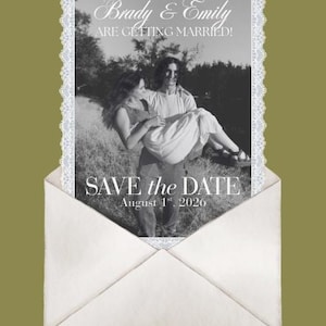 May include: A monochrome save-the-date card showing a couple in an embrace, inside a white envelope. The card reads "Brady & Emily ARE GETTING MARRIED!" and "SAVE the DATE August 1st, 2026". The card has a decorative lace border.