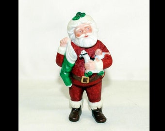 1998 hallmark keepsake miniature Christmas ornament jolly St. Nick Santa Clause. Always sealed in shrink wrap never displayed or played with
