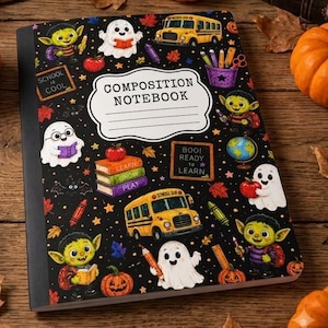 May include: A black composition notebook featuring a repeating pattern of ghosts, yellow school buses, green creatures, apples, and school supplies. The center white label reads COMPOSITION NOTEBOOK with lines for writing. The cover includes small chalkboards with text.