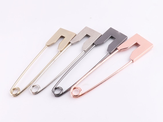 Giant safety pin best sale brooch