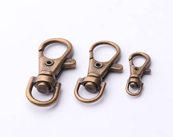38mm 33mm 23mm Antique Latón giratorio ganchos de presión giratorios cierre giratorio Swivel Gancho giratorio Swivel langosta cierre gancho Landyard Clip Bolsa de langosta cierre