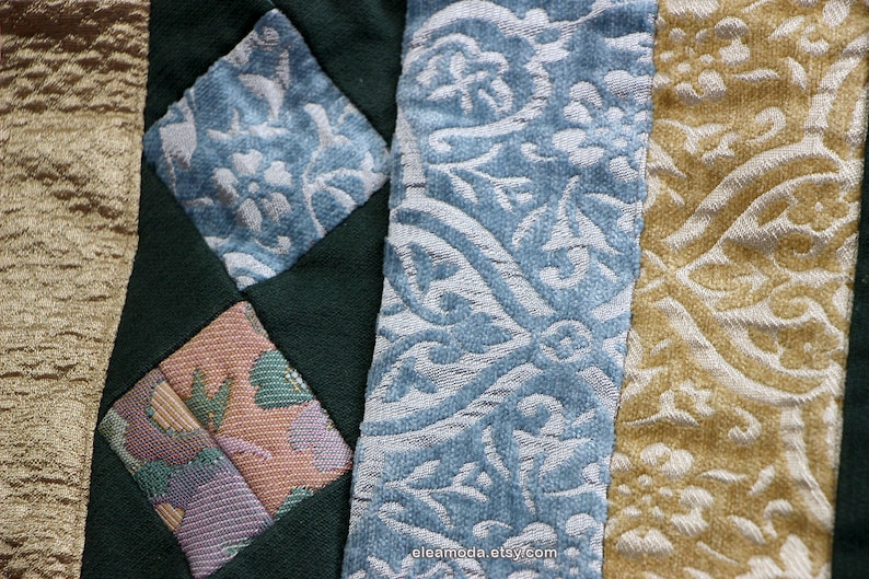 Quilted table mat in yellow and blue floral velvet for children.