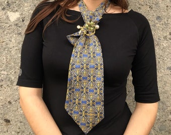 Unique, silk, blue tie with gold yellow pattern. Vintage necktie redesigned for women with brooch and pin. Luxury designed gift for her.