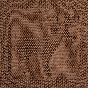May include: A brown knitted dishcloth with a textured pattern. The dishcloth is made of cotton and is designed to be absorbent and durable.
