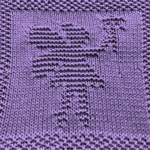 May include: A purple knitted dishcloth with a geometric pattern.