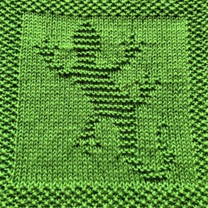 May include: A green knitted dishcloth with a textured pattern. The dishcloth is made of cotton yarn and is ideal for cleaning dishes and wiping surfaces.