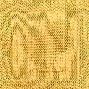 May include: A yellow knitted dishcloth with a geometric pattern.
