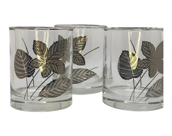 Juego de 3 vasos de whisky Libbey vintage con detalles en pan de oro, estilo MCM, color negro y dorado.