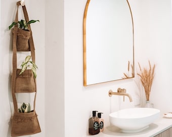 Hessian handmade hanging for plants, bathroom vanities or kitchen utilities. Store anything.Made in Noosa, Australia.