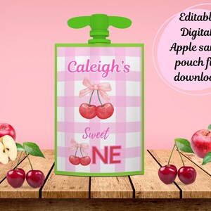May include: Editable digital apple sauce pouch file download. Pink and white gingham pattern with a green lid, cherries, and the text "Caleigh's Sweet One".