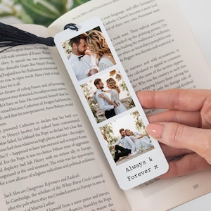 May include: A white bookmark featuring three photographs of a couple, with the words "Always & Forever x" printed in black. The bookmark is positioned over an open book.