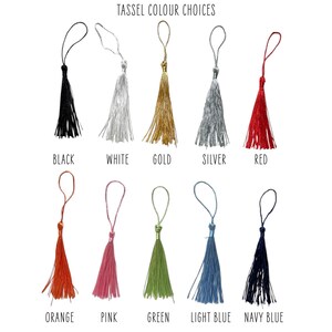 May include: A selection of tassels in various colors, including black, white, gold, silver, red, orange, pink, green, light blue, and navy blue. Each tassel has a loop at the top. The text "TASSEL COLOUR CHOICES" is at the top.