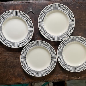 Set of Four (4) Black and White MCM Paul McCobb 10.25” Plates