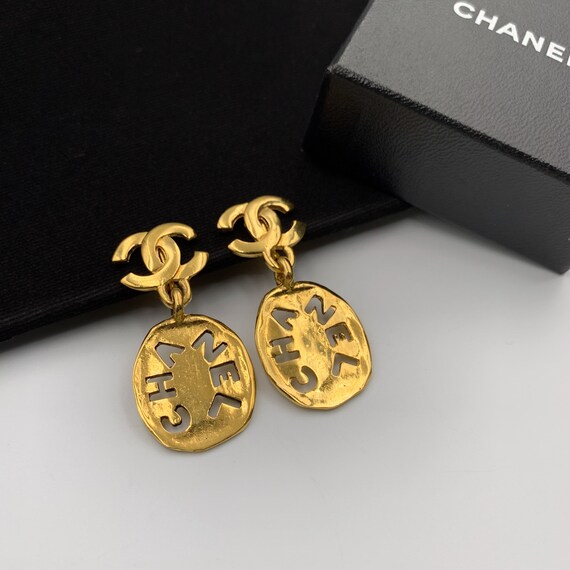 CHANEL Vintage 1980s Logo Coin Drop Clip on Earrings - Etsy CHANEL Vintage 1980s Logo Coin Drop Clip on Earrings - Etsy