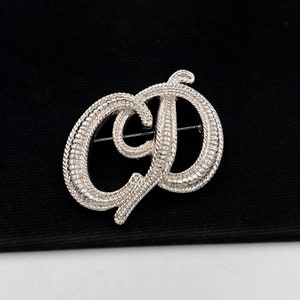 CHRISTIAN DIOR Vintage CD logo Brooch