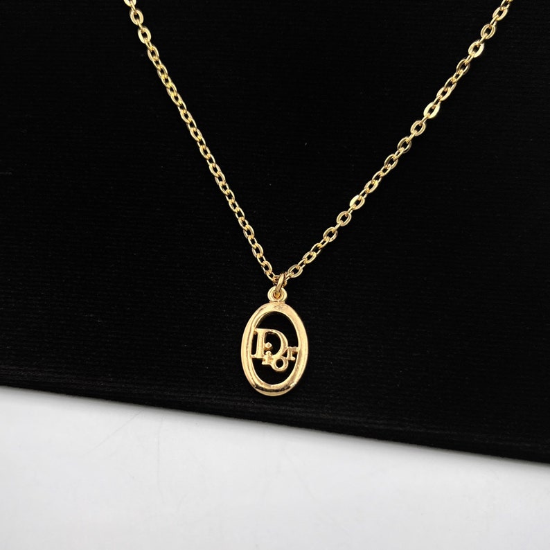 Christian Dior Vintage Dior Oval Gold Plated Logo Necklace 