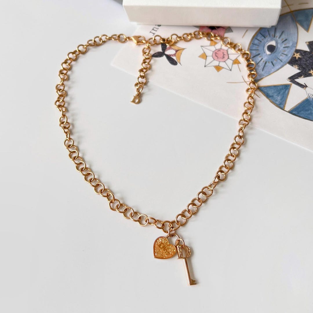christian dior heart padlock