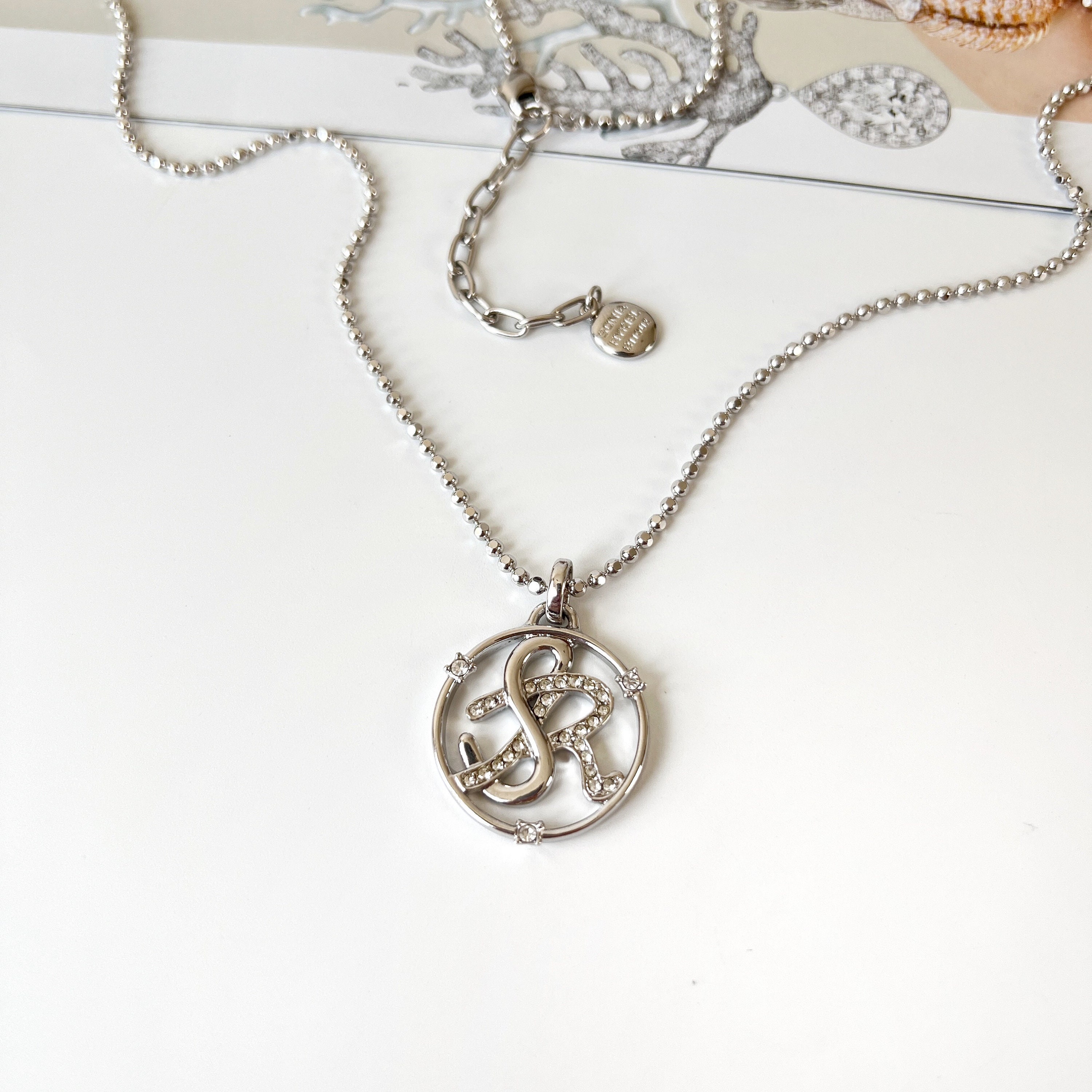 vintage SONIA RYKIEL ネックレス ロゴチャーム SONIA RYKIEL Vintage SR Crystal Round Logo Pendant Necklace - Etsy