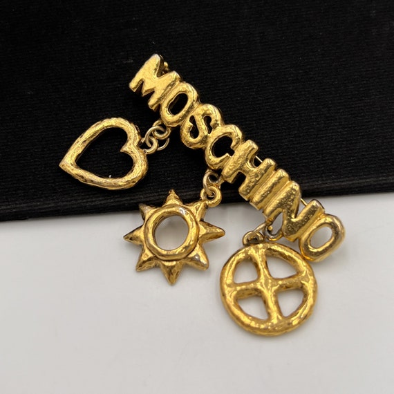 Moschino brooch best sale