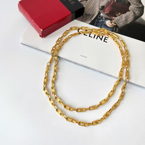 Shop CELINE Triomphe Maillon Triomphe Necklace In Gold Brass  (46S896BRA.35OR) by Vol_Tina | BUYMA