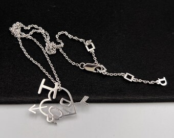 Christian Dior Vintage Dior Heart Arrow Silver Plated Logo