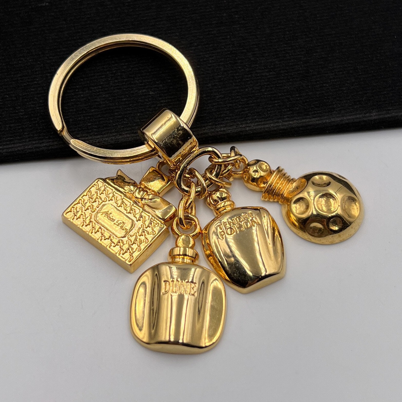 Louis Vuitton keychain : 1890 , Dior Sauvage perfume : 950