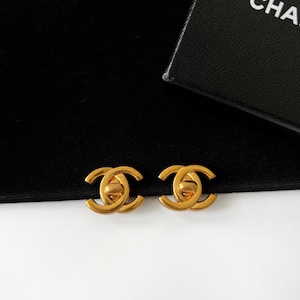 CHANEL Vintage Gold Plated Logo Turn locked Shape Clip on Earrings