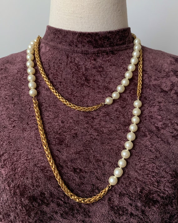 Sold at Auction: 8 mm round cream color faux pearl gold tone clasp knotted  necklace, 24 1/2 inches, Japan