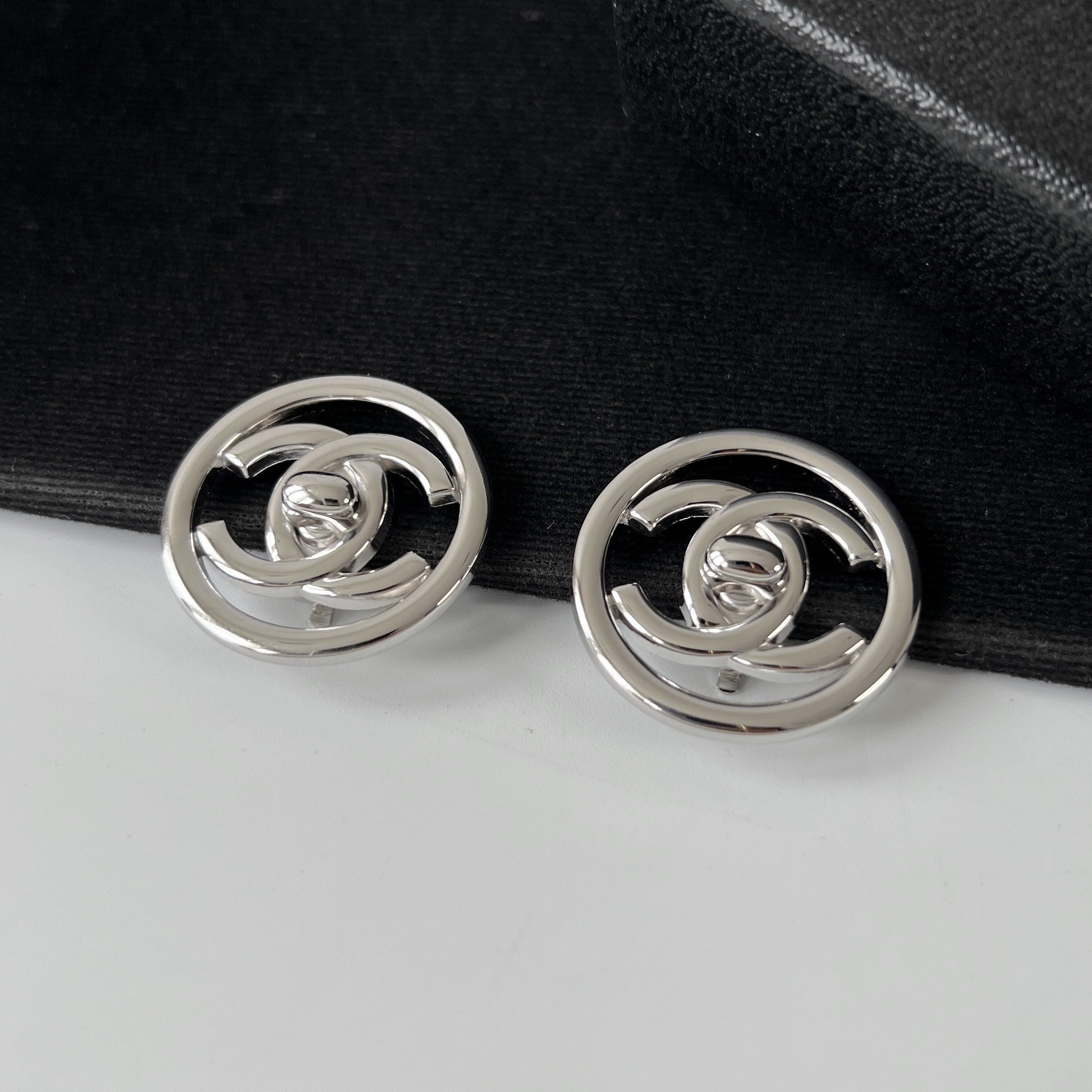 CHANEL Vintage Silver Plated Logo Turn Locked Shape Clip on