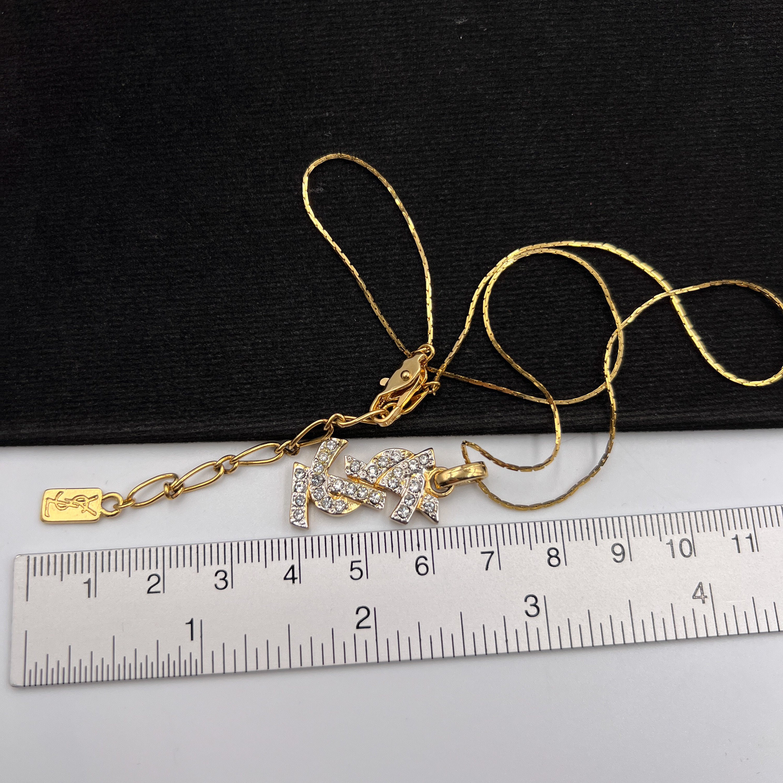YSL Vintage Gold Plated YSL Logo With Crystal Pendant YSL Vintage Gold Plated YSL Logo With Crystal Pendant