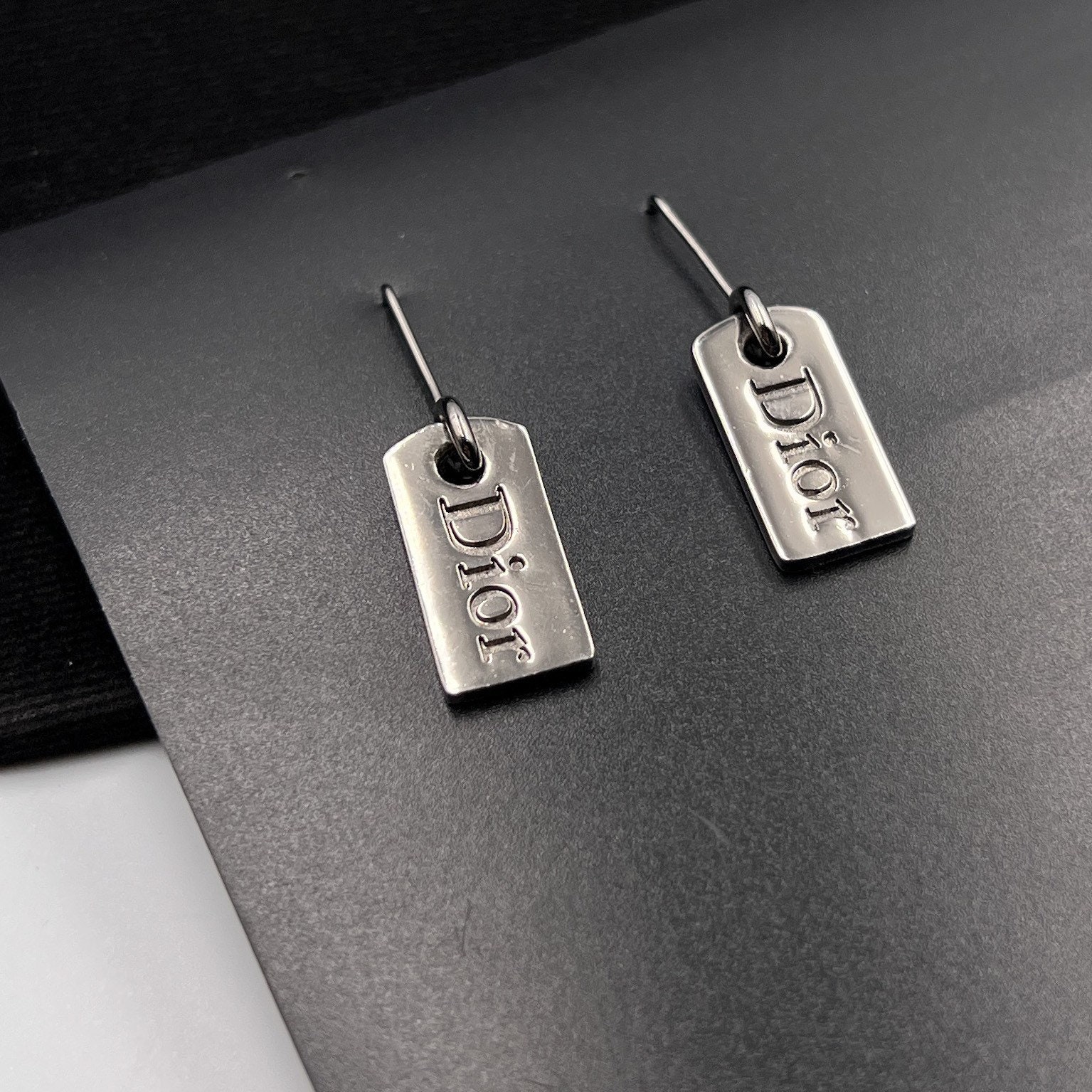 Dior earrings mens deals