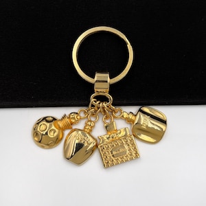 Dior gold keychain - Etsy 日本