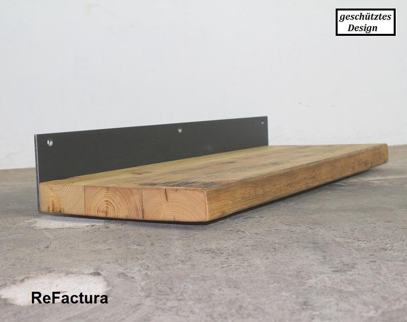 May include: A wooden shelf with a black metal bracket. The shelf is made of natural wood with a rustic finish. The bracket is attached to the wall with screws.