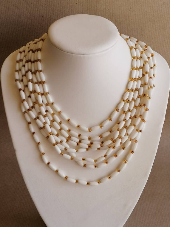 Details about   Vintage white glass eight strand beaded necklace 