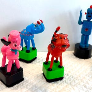 Vintage push puppet/vintage collapsible push toy/Kohner style push puppet toy/push Flintstone toy/push toy cat/Kohner push puppet toy