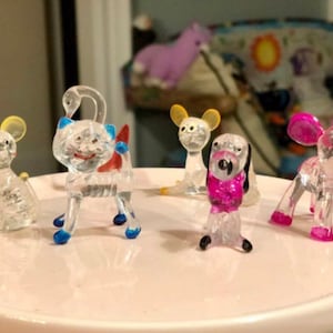 Juguetes de dinosaurio miniatura de juguete de EE. UU. para niños y niñas,  juguetes de plástico surtidos, estilos y colores, lote de 12, juguetes para