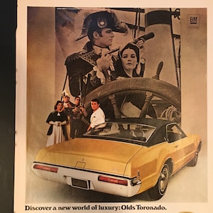 1969 Oldsmobile Toronado Ad: Classic Car Pirate Movie Scene Print
