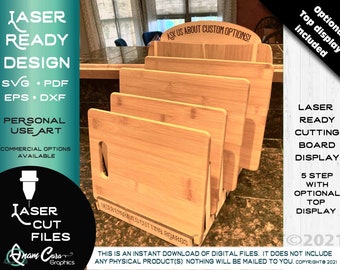 May include: A five-step bamboo cutting board display stand with an optional top display. The stand is laser-cut and engraved with the text "Laser Engraved Cutting Boards". The image includes the text "Ask Us About Custom Options!" and "Optional Top Display Included".