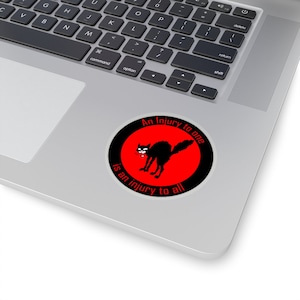Unite for Justice: Display Your Beliefs with this Sabo Tabby 'An Injury to One is an Injury to All' Kiss-Cut Sticker