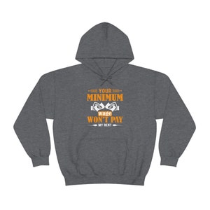 May include: Gray hooded sweatshirt with the text "YOUR MINIMUM wage WON'T PAY MY RENT" in white and orange. The text is surrounded by arrows.