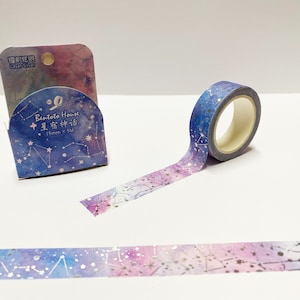 May include: Washi tape roll with a starry night design. The tape has a blue, purple, and pink gradient with silver star details. The packaging displays the text "Bentoto House" and Japanese characters. The tape is 15mm x 5M.