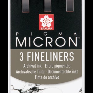 May include: A package of three Pigma Micron fineliners. The pens have beige barrels and silver tips. The package includes the pen sizes 005 (0.20mm), 01 (0.25mm), and 03 (0.35mm). The packaging features a motorcycle illustration.