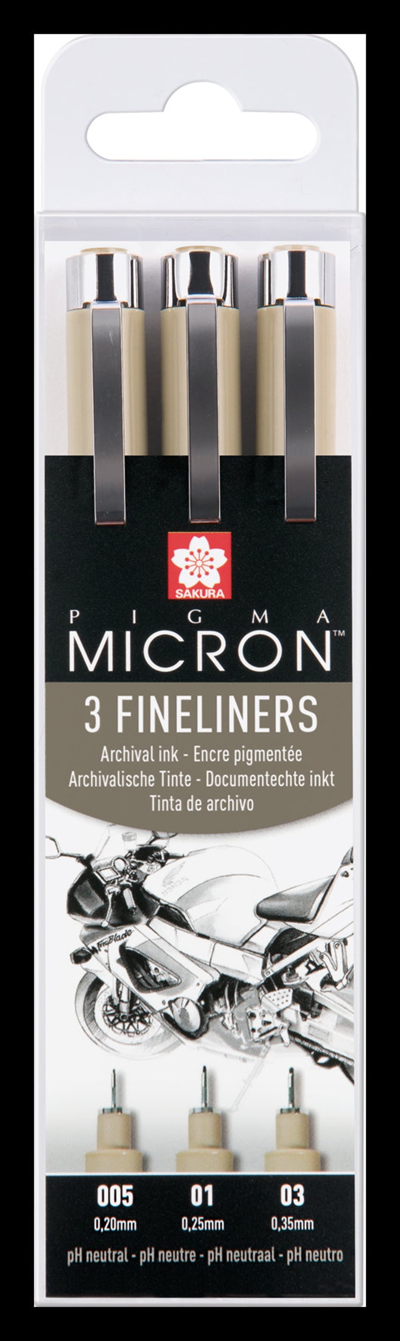 May include: A package of three Pigma Micron fineliners. The pens have beige barrels and silver tips. The package includes the pen sizes 005 (0.20mm), 01 (0.25mm), and 03 (0.35mm). The packaging features a motorcycle illustration.
