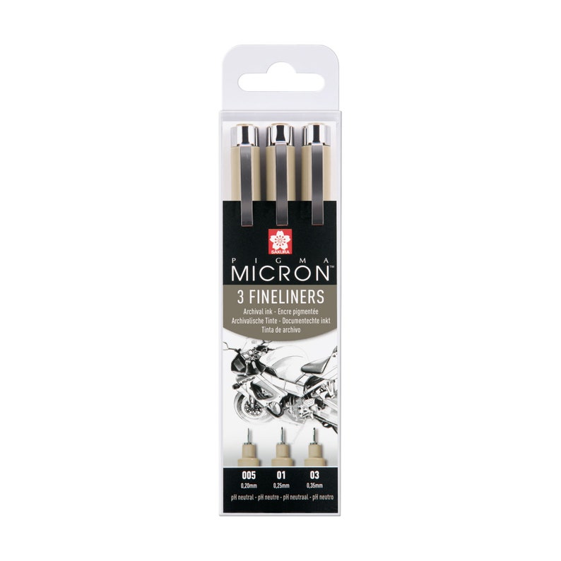 May include: A package of Sakura Pigma Micron 3 fineliners. The package is white with a black label that reads "MICRON 3 FINELINERS". The fineliners are black and silver. The package also includes the sizes of the fineliners: 005, 01, and 03.