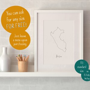 May include: A framed print of the outline of Peru, with the country's name in cursive below. The print is in a white frame and is displayed on a white shelf. Text on the image says "You can ask for any size FOR FREE!" and "A3 standard size = 29.7x42 cm."