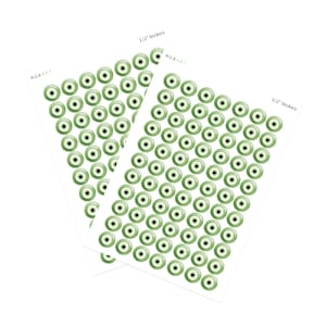 154 Green Evil Eye Stickers - Half inch evil eye stickers. Approx. 4.5&quot;x6.5&quot; Sticker Sheet. Made in USA.