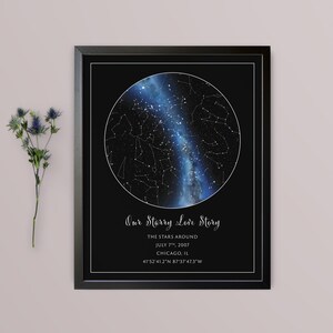 May include: Framed print featuring a celestial map within a circular design, set against a black background. The print includes the text "Our Starry Love Story" and details: July 7th, 2007, Chicago, IL, and coordinates.